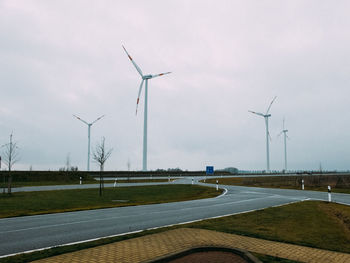 Wind turbines on field