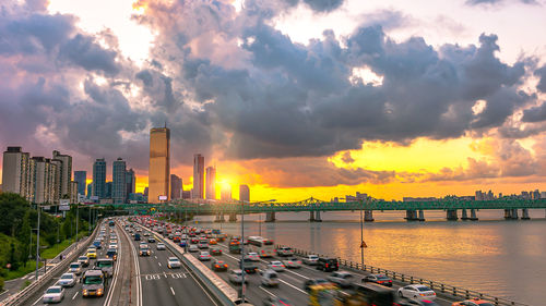 High angle view of city at sunset