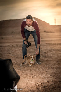 Full length portrait of man on land