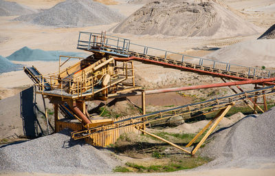 Gravel quarrying in a gravel pit during a drone flight