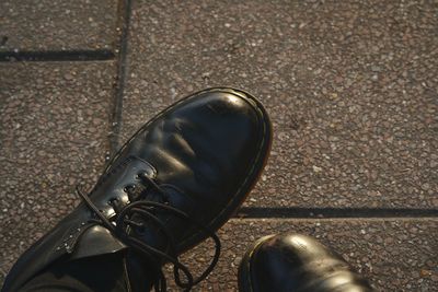 High angle view of shoes on street