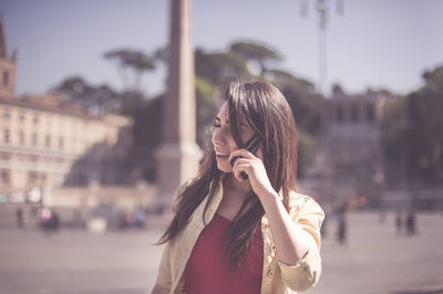 Woman standing in park