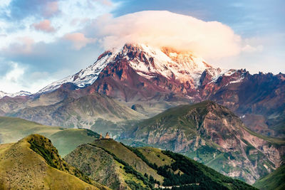 Scenic view of snowcapped mountains against sky