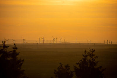 Scenic view of silhouette landscape against sky during sunset