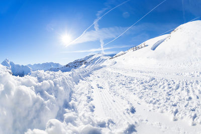 Scenic view of snowcapped mountains against sky