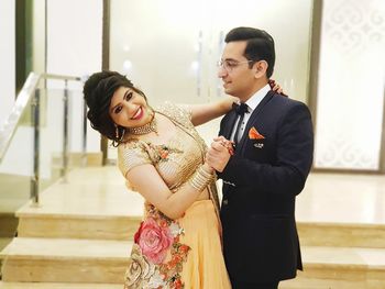 Young couple standing outdoors