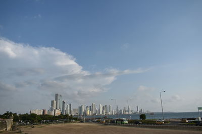 View of city against cloudy sky