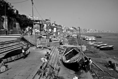 Boats moored at harbor