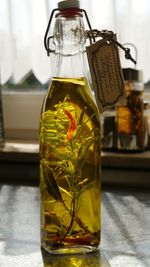 Close-up of drink in glass jar on table