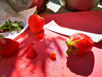 High angle view of chopped fruits in plate on table