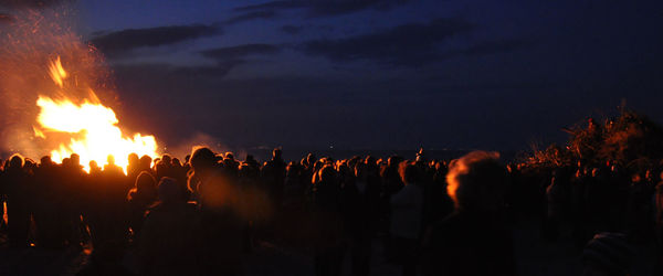 Panoramic view of crowd at night