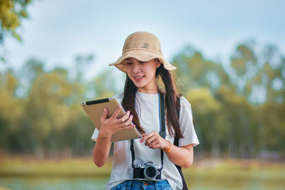 Young woman using mobile phone