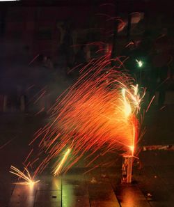 Firework display at night