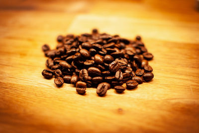 Close-up of coffee beans on table