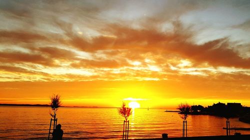 Scenic view of sea at sunset