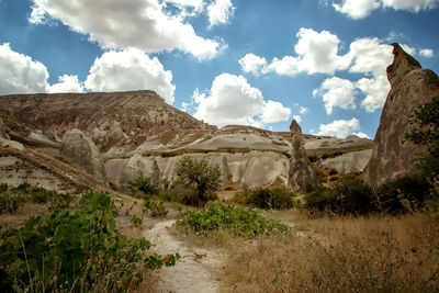 Panoramic view of rocky mountains against sky