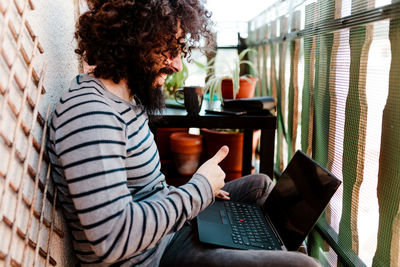 Young man using laptop