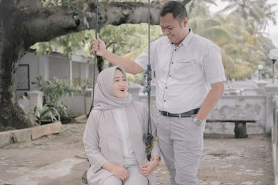 Young couple standing outdoors