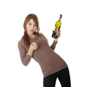 Portrait of a young woman against white background