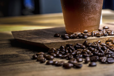 Close-up of coffee beans on table