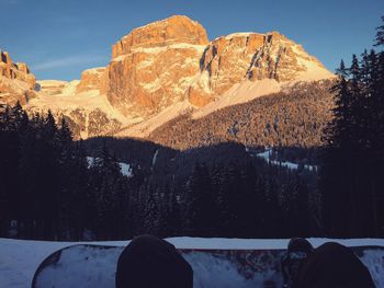 Scenic view of snowcapped mountains against sky during winter