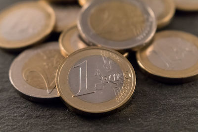 Close-up of euro coins on table