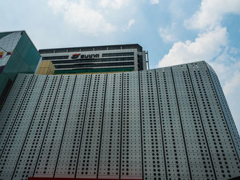 Low angle view of modern building against sky