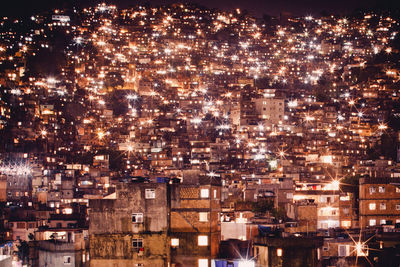 Aerial view of illuminated cityscape at night