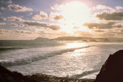 Scenic view of sea against sky during sunset