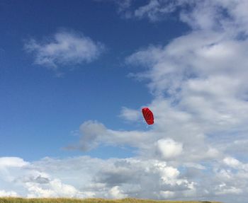 Low angle view of kite flying in sky