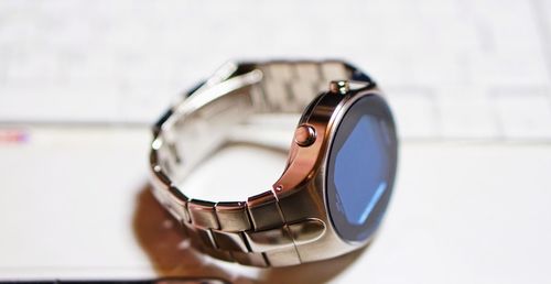 Close-up of wristwatch on table