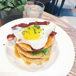 Close-up of breakfast served on table at sidewalk cafe