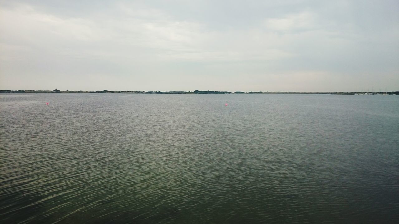 water, tranquil scene, waterfront, sea, tranquility, sky, scenics, rippled, beauty in nature, nature, cloud - sky, idyllic, horizon over water, cloud, no people, outdoors, seascape, day, remote, calm