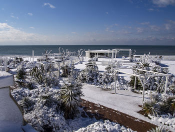 Scenic view of sea against sky during winter