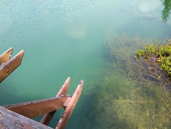 High angle view of boat moored in lake