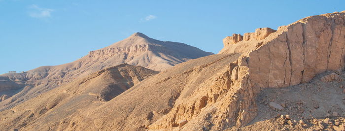 Scenic view of mountain range against clear sky