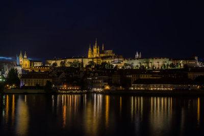 Illuminated city lit up at night