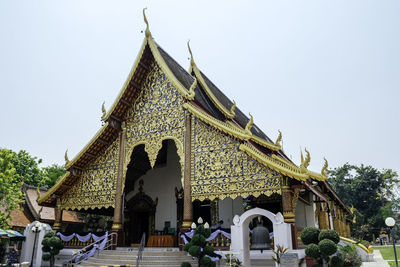 Low angle view of temple building against sky