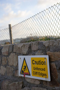 Information sign on brick wall