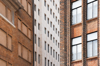 Low angle view of modern buildings in city