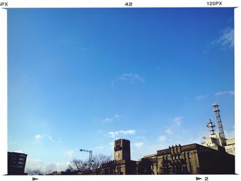 Low angle view of construction site against clear sky