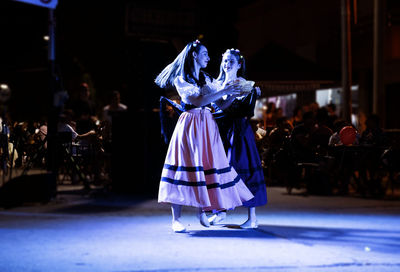 Portrait of girls dancing italian music