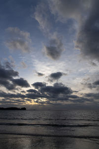 Scenic view of sea against dramatic sky
