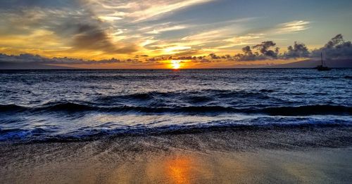 Scenic view of sea against sky during sunset