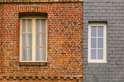 Window on brick wall of building