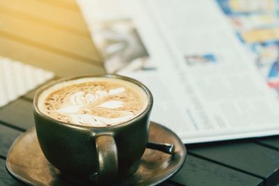 Close-up of cappuccino on table