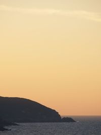 View of calm sea at sunset