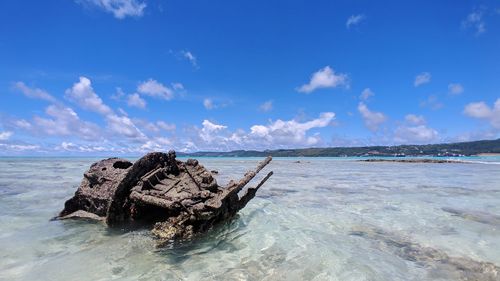 Scenic view of sea against blue sky