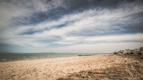 Scenic view of beach against sky