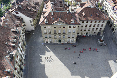 High angle view of street amidst buildings in town